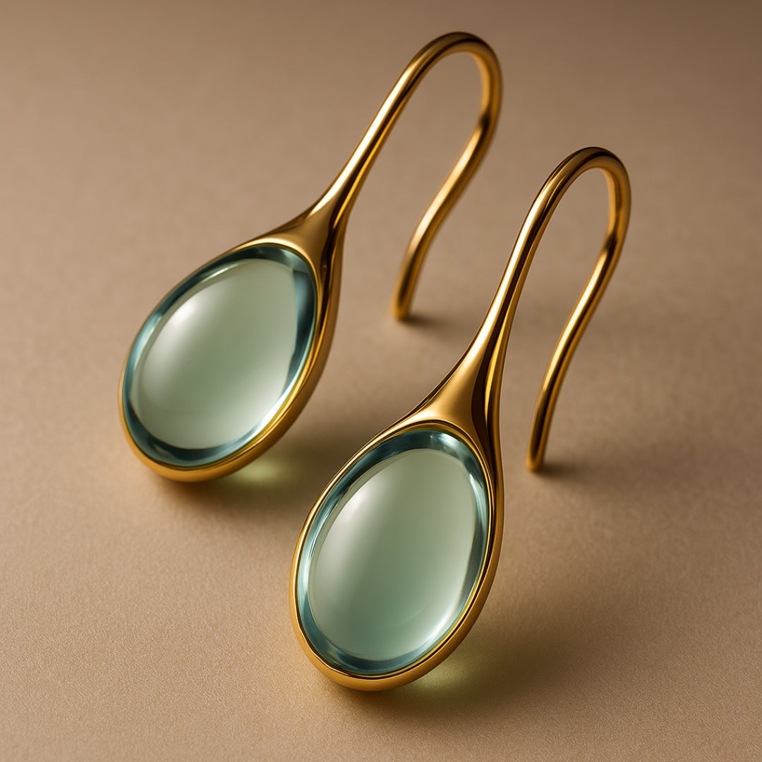 Visiace kryštálové náušnice v zlatej a striebornej 